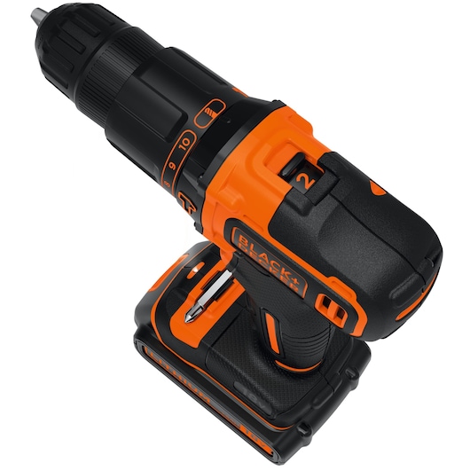 Cordless BLACK+DECKER power drill with orange and black design, featuring a rechargeable battery and adjustable torque settings.
