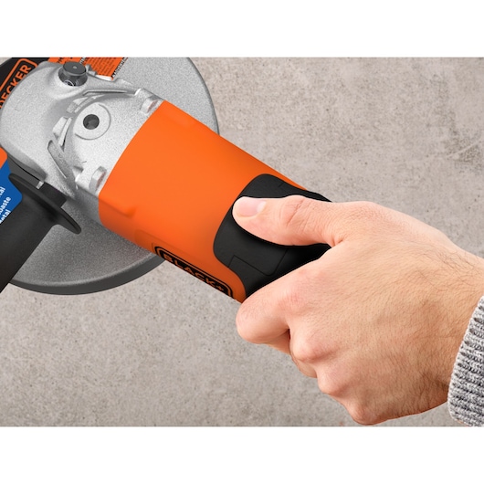 The power switch of the BLACK+DECKER® 2200W 230mm Electric Large Angle Grinder.