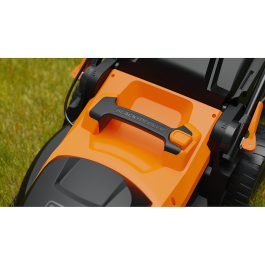 Close up view of the BLACK+DECKER BEMWP400 40cm 1800W Corded Mower height adjustment button