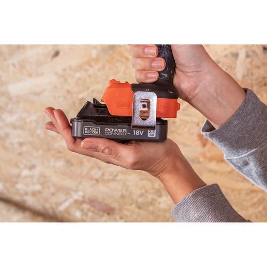 Photo of BLACK+DECKER 18V Power Connect battery tool BLD782E2K in hand, highlighting compact design.