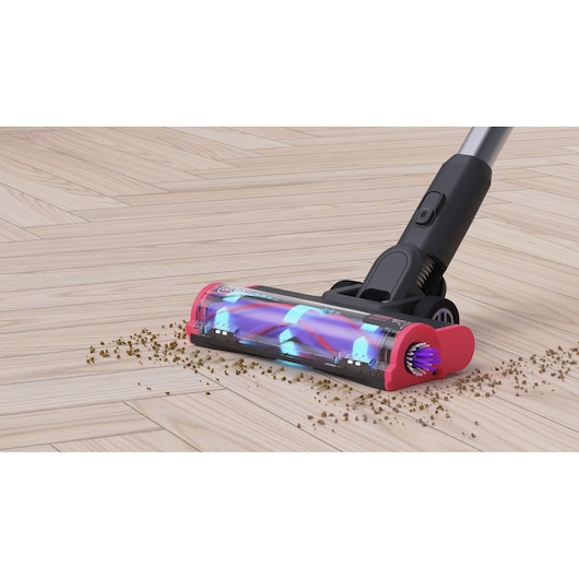 The floorhead in action on a hardwood floor - BLACK+DECKER SUMMITSERIES select Pet cordless stick vacuum.