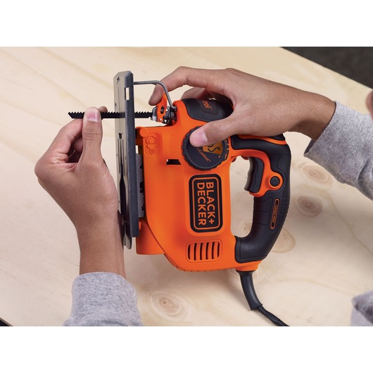 A blade being replaced for the BLACK+DECKER® 550W AUTOSELECT® Pendulum Jigsaw.